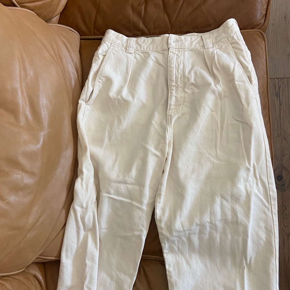 Ozma white pants with pleats. The waist runs slightly small